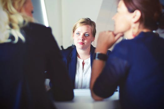 Senior leader in a meeting where honest feedback has stopped reaching her